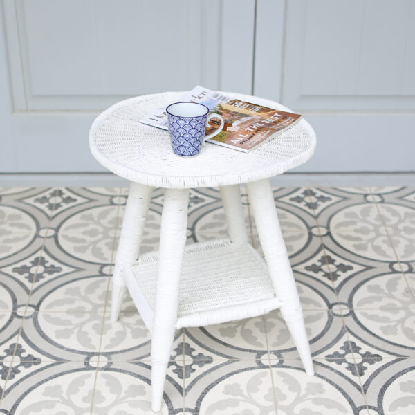 white side table with magazine and mug