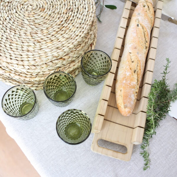 baguette board on table setting with glasses
