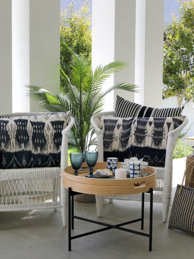 Conran table tray with malawi chairs and blue and white soft decor items