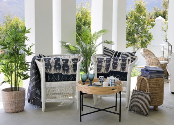 Conran table tray with malawi chairs and blue and white soft decor items