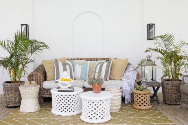 luxury villa patio seating with stools and tables