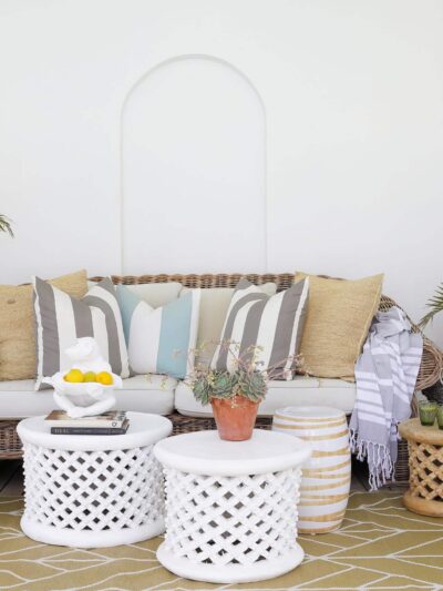 luxury villa patio seating with stools and tables
